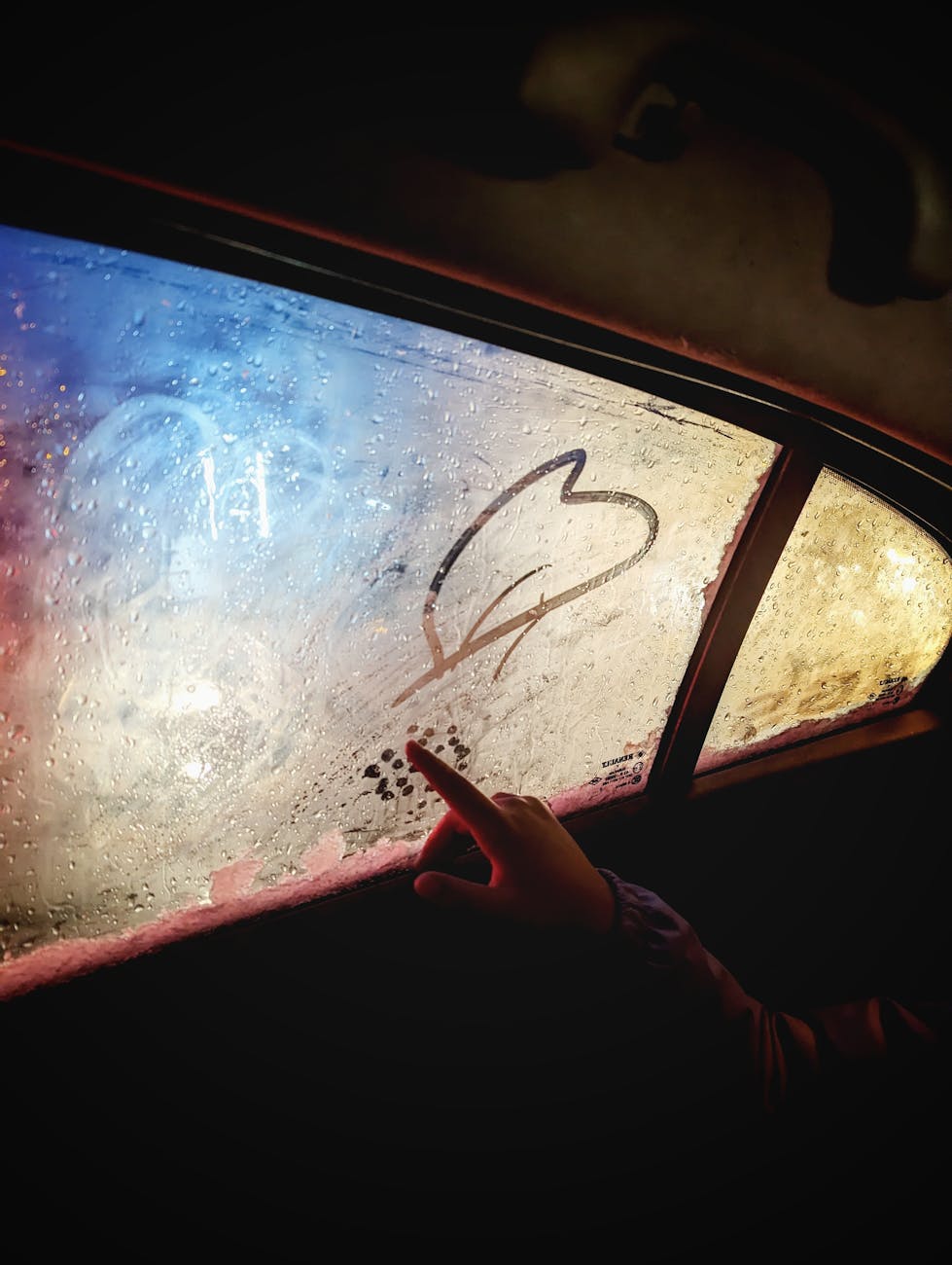 Photo by Nedelcu Catalin on <a href="https://www.pexels.com/photo/hand-drawing-a-heart-on-the-steamy-car-window-15316723/" rel="nofollow">Pexels.com</a>